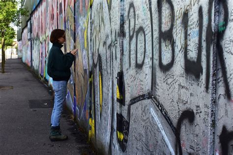 should graffiti be considered art or vandalism? does graffiti help to beautify the city?